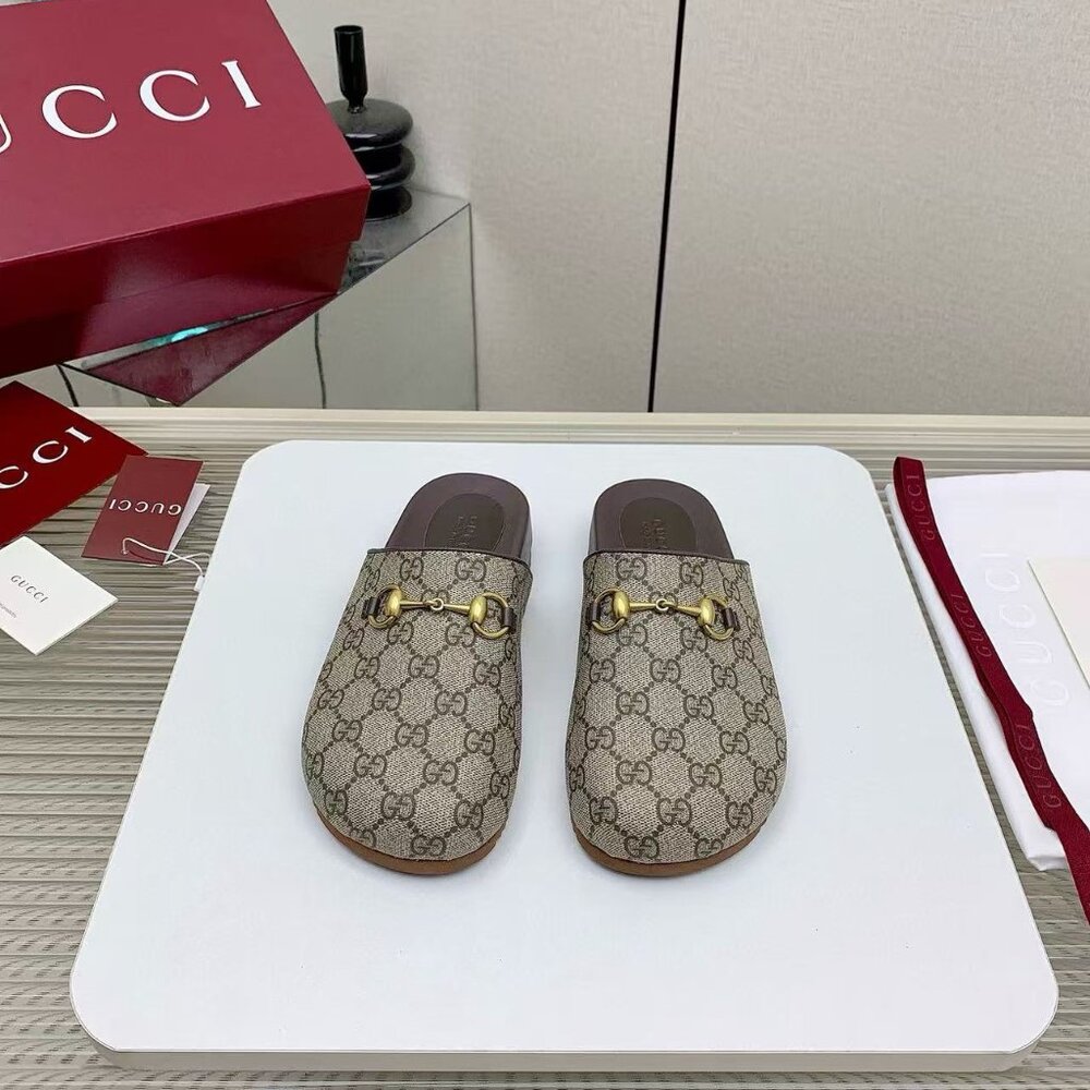 Gucci mule slippers in GG Supreme canvas
